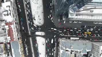 Top view of Kyiv traffic, cars and snow video