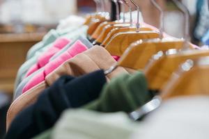 fashion clothing on hangers at the show photo