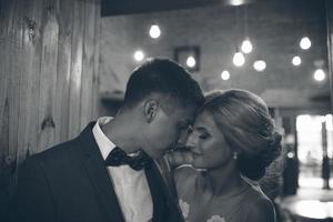 The bride and groom in a cozy house photo