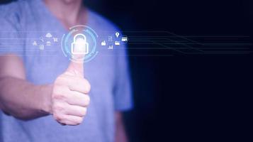 Cybersecurity and privacy concepts to protect data. Lock icon and internet network security technology. Businessman protecting personal data on smart phone with virtual screen interfaces. photo