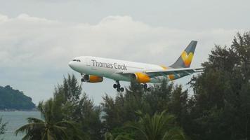 PHUKET, THAILAND DECEMBER 1, 2018 - Thomas Cook Airlines Scandinavia Airbus A330 343 OY VKF approaching before landing, International Phuket Airport video