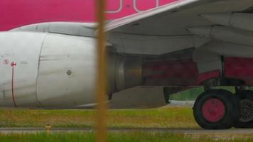 Airplane at the start before departure, close up of wing, engine and gear video