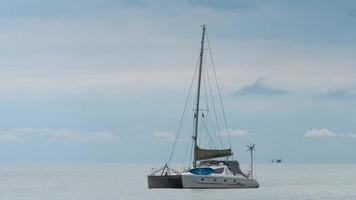 Sailing boat anchored in a sea. Andaman Sea, Thailand video