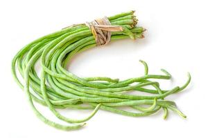 bundle of fresh long beans Vigna unguiculata subsp. sesquipedalis isolated on a white background photo