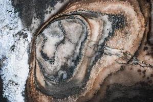 veins of different minerals in a salt mine photo