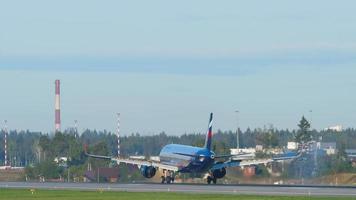 MOSCOW, RUSSIAN FEDERATION SEPTEMBER 12, 2020 - Rear view of an Airbus A320 Aeroflot landing and braking at Sheremetyevo airport. Cinematic footage of an airplane flying video