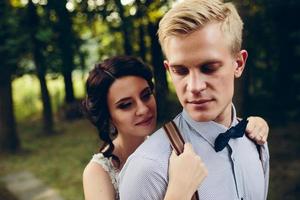 Beautiful wedding couple posing photo