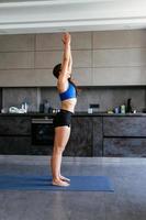 Young Woman Doing Yoga Pose Exercise Healthy Lifestyle photo