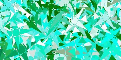 Light Green vector pattern with polygonal shapes.