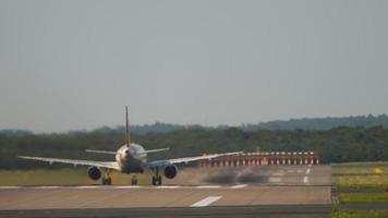 Aiplanet takes off, rear view. View of the airfield, airport runway. Passenger airplane departure. Tourism and aviation concept video