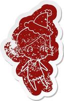 cartoon distressed sticker of a friendly girl wearing santa hat vector