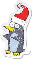 retro distressed sticker of a cartoon christmas penguin vector