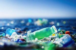 Problem plastic bottles and microplastics floating in the ocean. photo