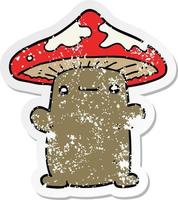 distressed sticker of a cartoon mushroom vector