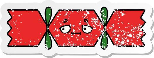 distressed sticker of a cute cartoon christmas cracker vector