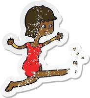 retro distressed sticker of a cartoon happy woman kicking vector