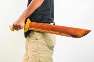 Man holding machete isolated photo