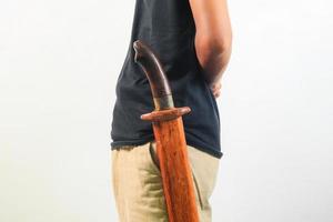 Man holding machete isolated photo