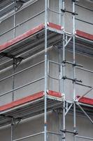 scaffolding at a construction site of a new building photo