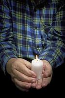 Hands and candle photo