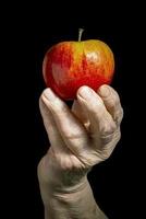 An apple in hands photo