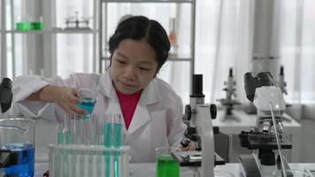 Young Girl Doing Experiment in Science Class video