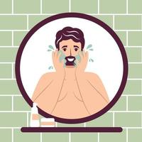 Skincare routine concept. Close up mirror reflection happy young man washes face with cleanser and soap, handsome bearded male enjoying skincare procedure. Men hygiene vector