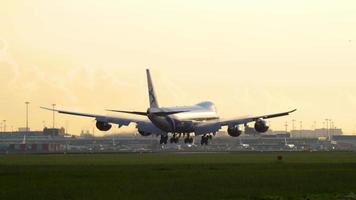 AMSTERDAM, THE NETHERLANDS JULY 25, 2017 - Air Bridge Cargo Boeing 747 VQ BRJ approaching before landing at runway 06 Kaagbaan at sunrise. Shiphol Airport, Amsterdam, Holland video