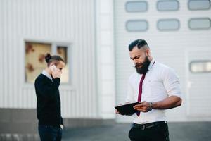 Two businessman at work photo