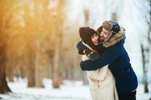 guy and girl in each other's arms photo