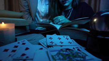 Two women are reading a mysterious book photo