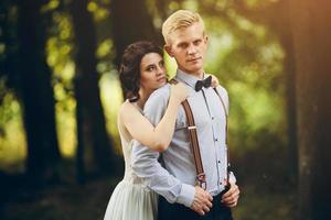 Beautiful wedding couple posing photo