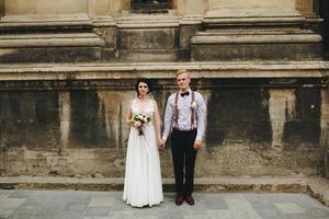 The bride and groom posing photo