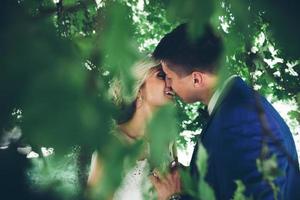 Beautiful wedding couple posing photo