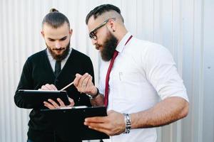 Two businessmen discussing something photo