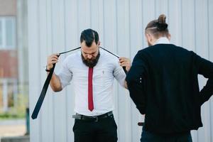 two businessmen prepared to work photo