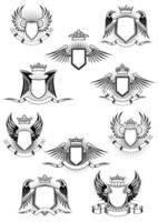 Heraldic winged shields with crowns and ribbon banners vector