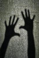 Two shadows hands photo