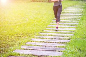 Woman running in park. photo