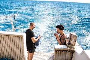 Couple relaxing on a yacht photo