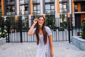 Woman on the background of large building photo