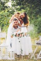 Young family with child at a picnic photo