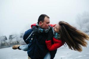 Young beautiful couple having fun photo