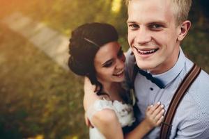 Beautiful wedding couple posing photo