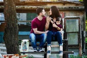 young family with a child on the nature photo