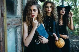 three vintage women as witches photo