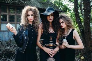 three vintage women as witches photo