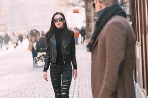 Couple walking and posing on the street photo