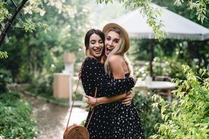 Two girls in a summer park photo