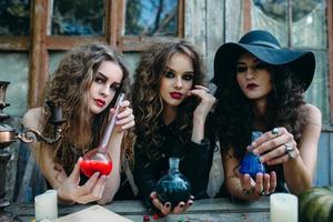 three witches at the table photo